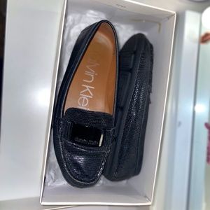 Used, in well condition CK black loafers.